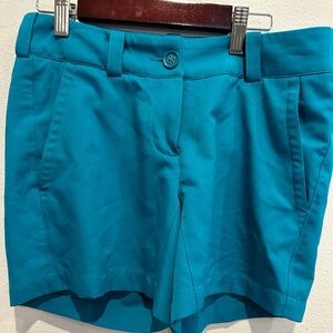 NWOT Nike golf shorts size 2..teal in color